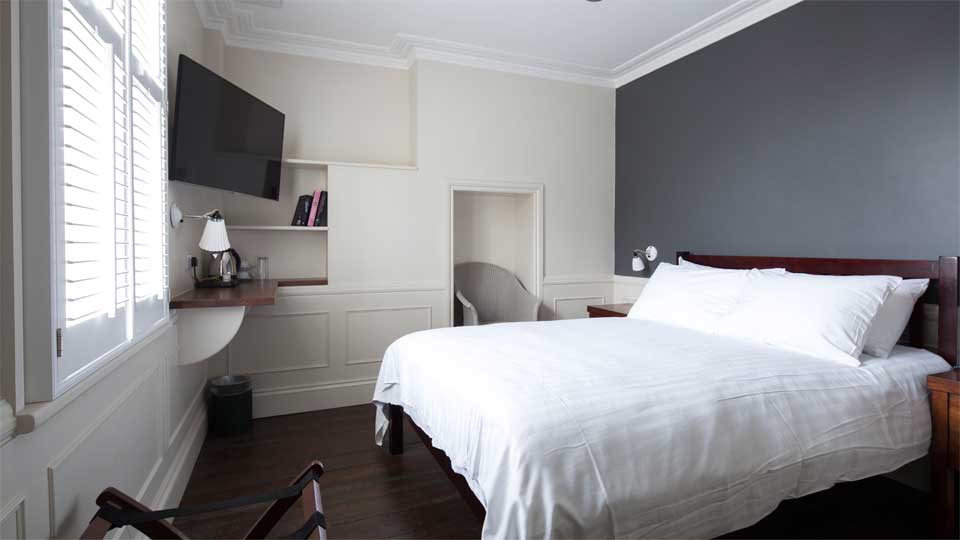 A larger bedroom at the Frontline Club